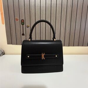 Black Handbag with Gold Accents